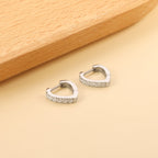 Boucles d'oreilles à clips en forme de cœur avec diamants