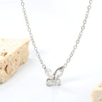 Ketting met vlinder en witte diamanthanger