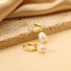 Cirkel- en ovale witte pareloorbellen met diamanten