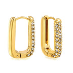 U-vormige oorbellen met witte diamanten