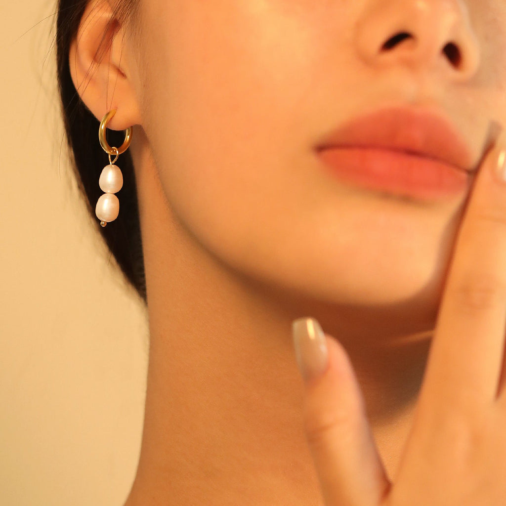 Lentecirkeloorbellen met witte parels