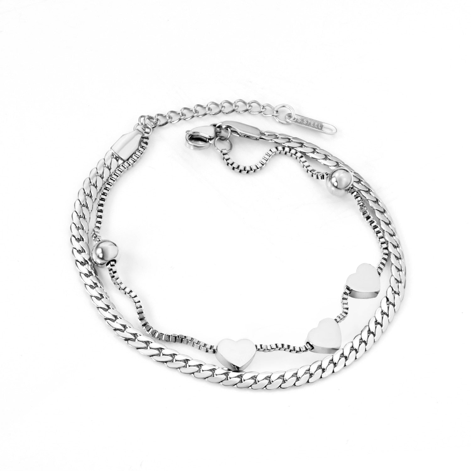 Dikke armband met gouden hartbedel 