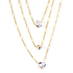 Drievoudige ketting met hartvormige hanger 