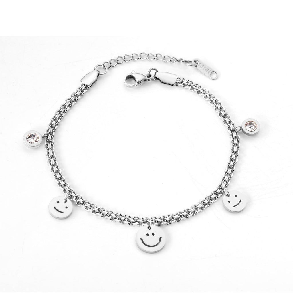 Dikke armband met gouden hartbedel 