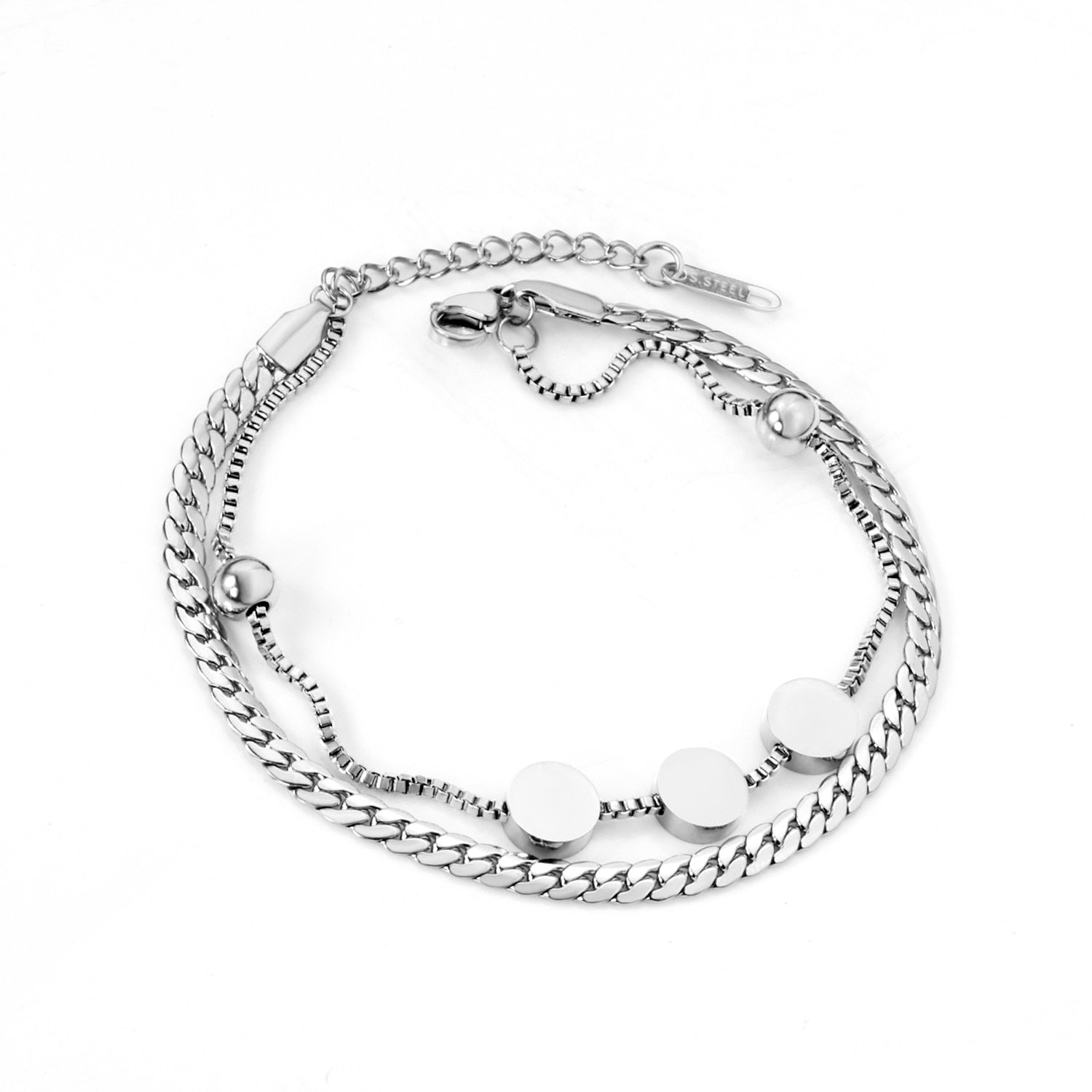 Dikke armband met gouden hartbedel 