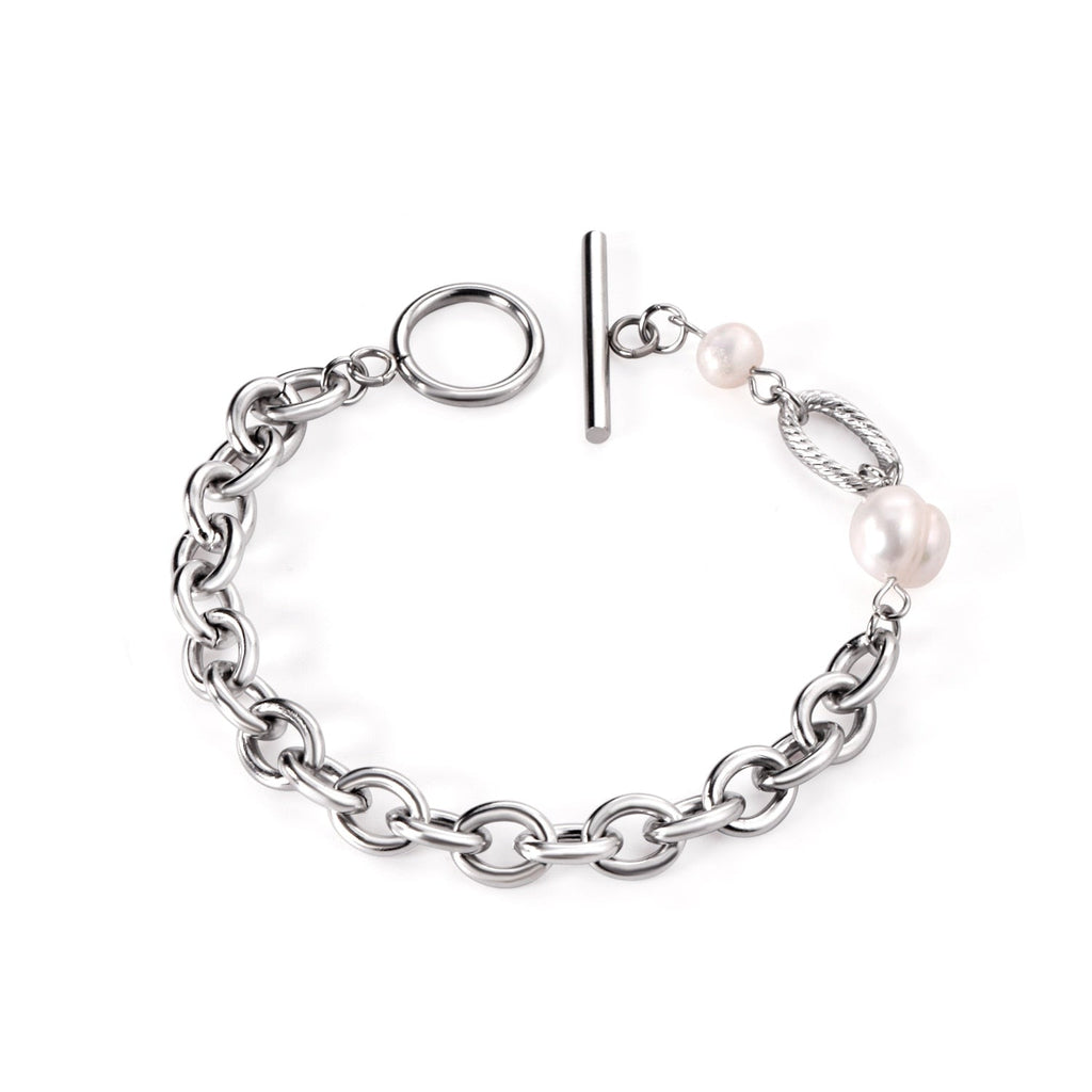 Dikke armband met gouden hartbedel 