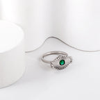 Zonvormige groene stenen ring