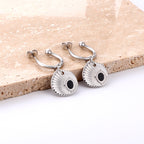 Halve cirkel stalen bal met zwarte schelp oorbellen