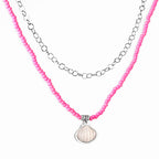 Dubbele ketting met schelpen en roze kralen