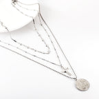 Drievoudige ronde ketting met kruishanger