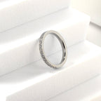 Bague solitaire en or et acier avec diamant