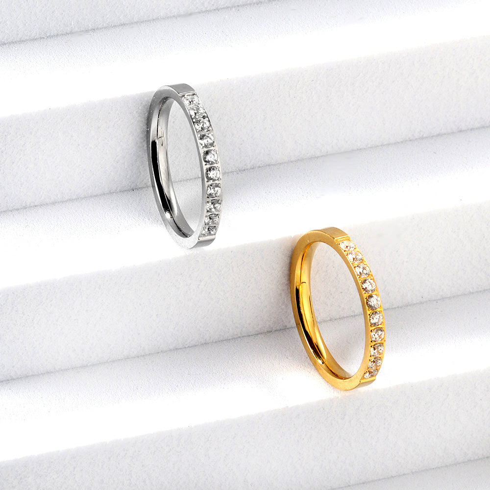 Bague solitaire en or et acier avec diamant