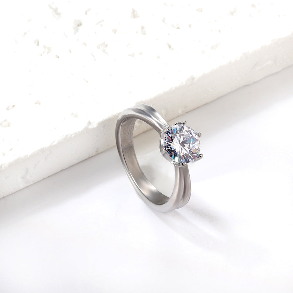 Vierklauw witte diamant glanzende ring