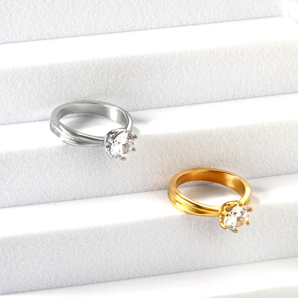 Vierklauw witte diamant glanzende ring