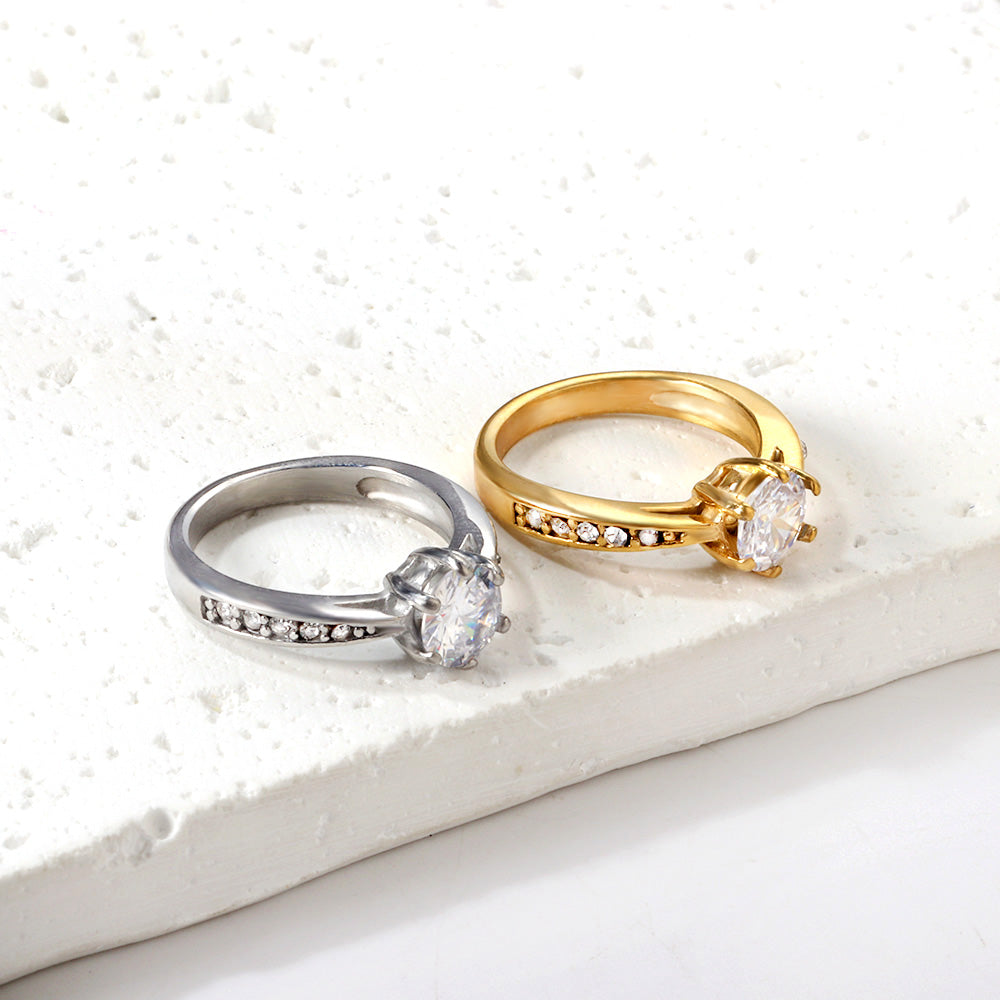 Solitaire diamanten accentring van goud en staal