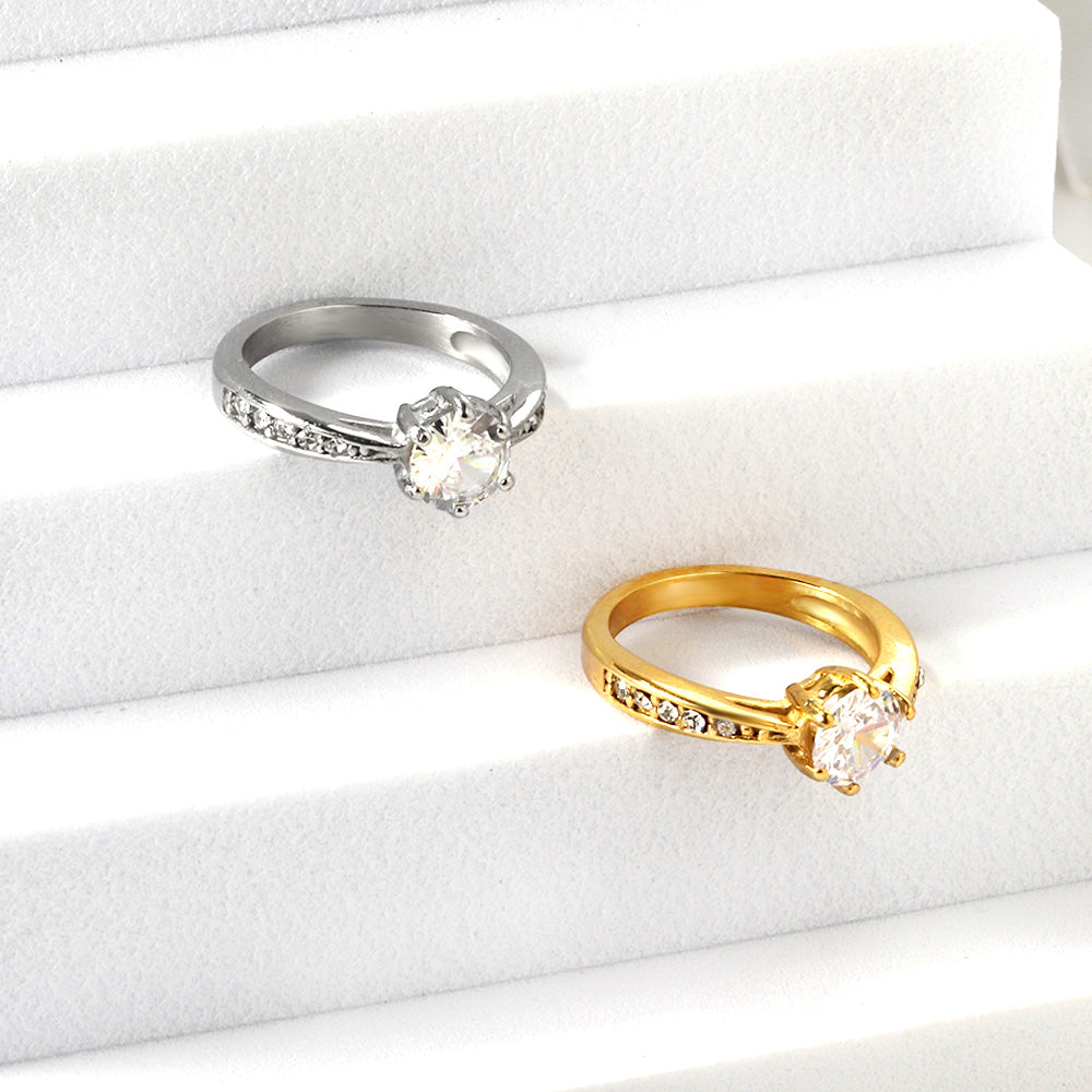 Solitaire diamanten accentring van goud en staal