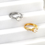 Solitaire diamanten accentring van goud en staal