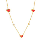 Collier avec pendentif triple cœur coquillage et diamant