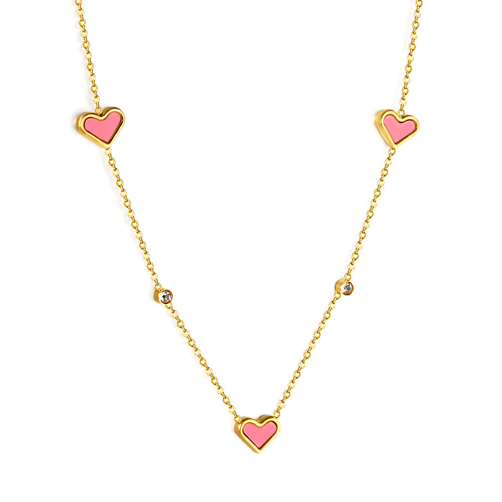 Drievoudige hartschelp en diamanten hanger ketting