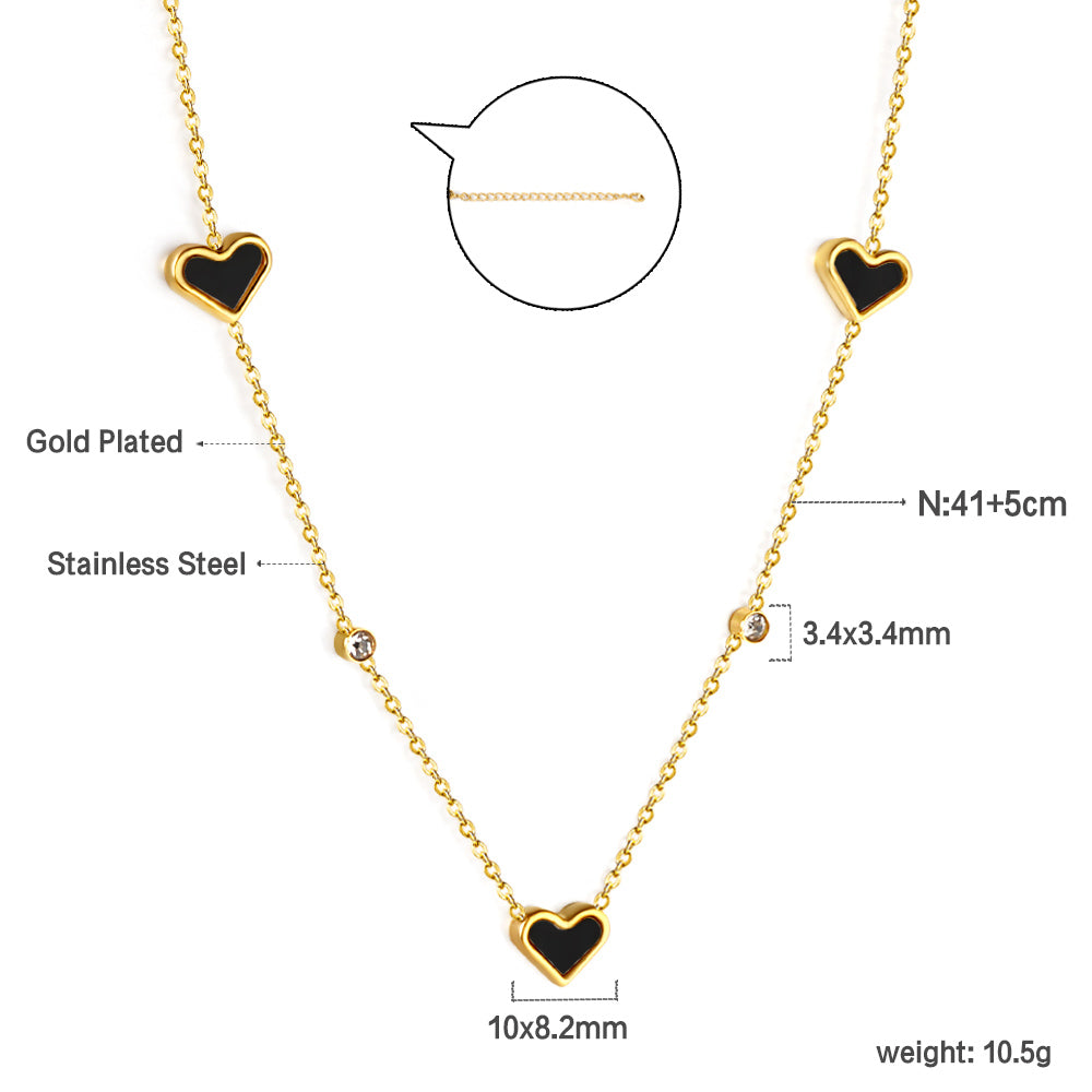 Drievoudige hartschelp en diamanten hanger ketting