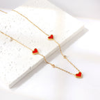 Collier avec pendentif triple cœur coquillage et diamant