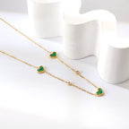 Collier avec pendentif triple cœur coquillage et diamant