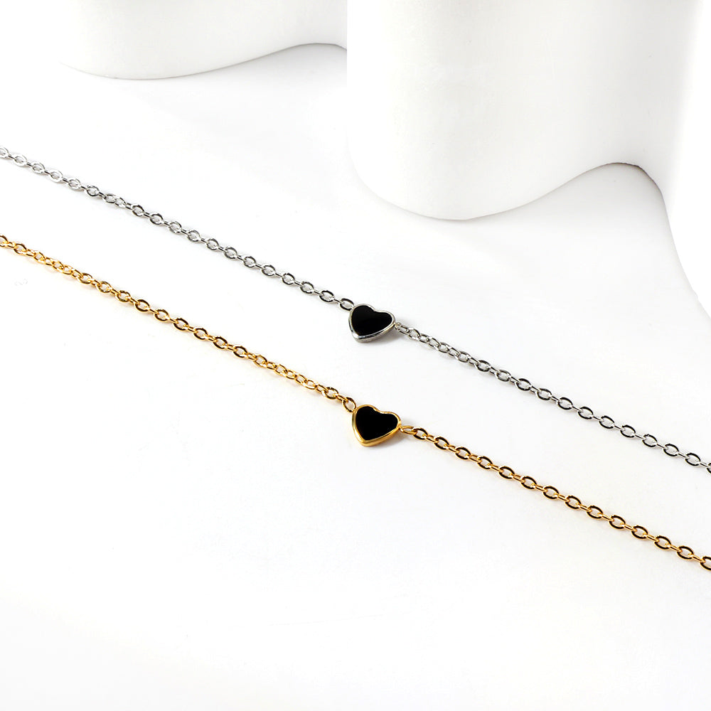 Bracelet à breloques cœur rouge et noir