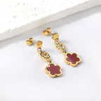 Perzikbloesem goudkleurige oorbellen met schelp