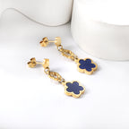 Perzikbloesem goudkleurige oorbellen met schelp