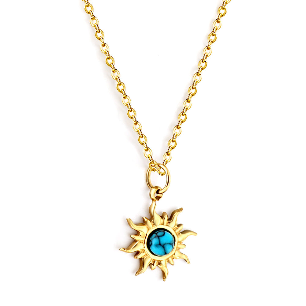JCS gold-tone stainless steel necklace featuring a round pendant with a blue flower stone — elegant, hypoallergenic, and water-resistant.