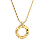 Gold textured circle pendant necklace on snake chain – minimalist stainless steel jewelry by JSC Jewelry.