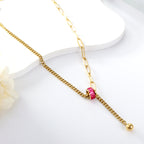 Rozerode zirkoon en stalen bolvormige hangerketting