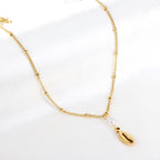 Collier avec pendentif en perle en forme de pince de homard