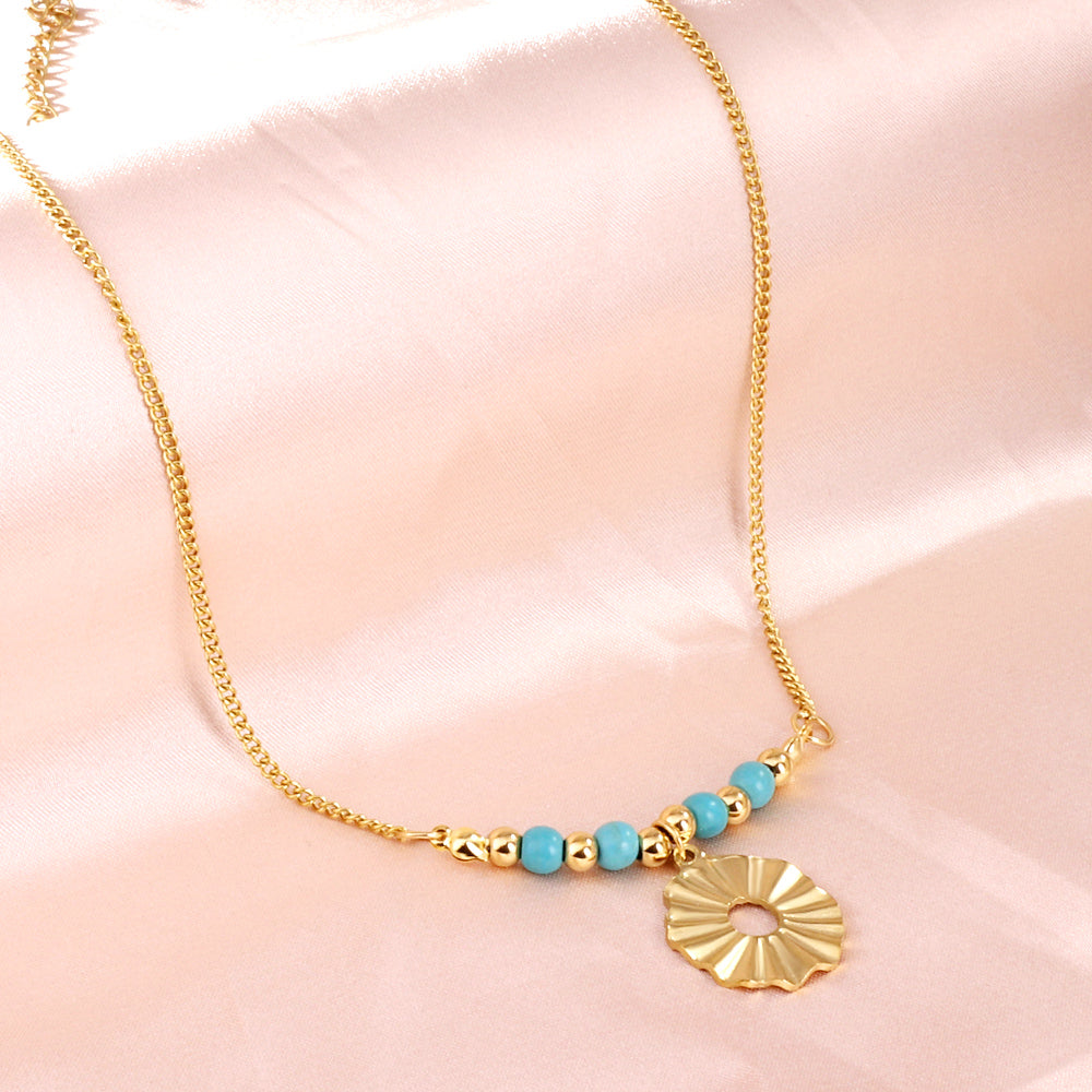 Ronde hangerketting met bloemkralen