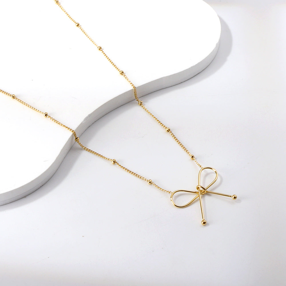 Golden Bow Pendant Necklace
