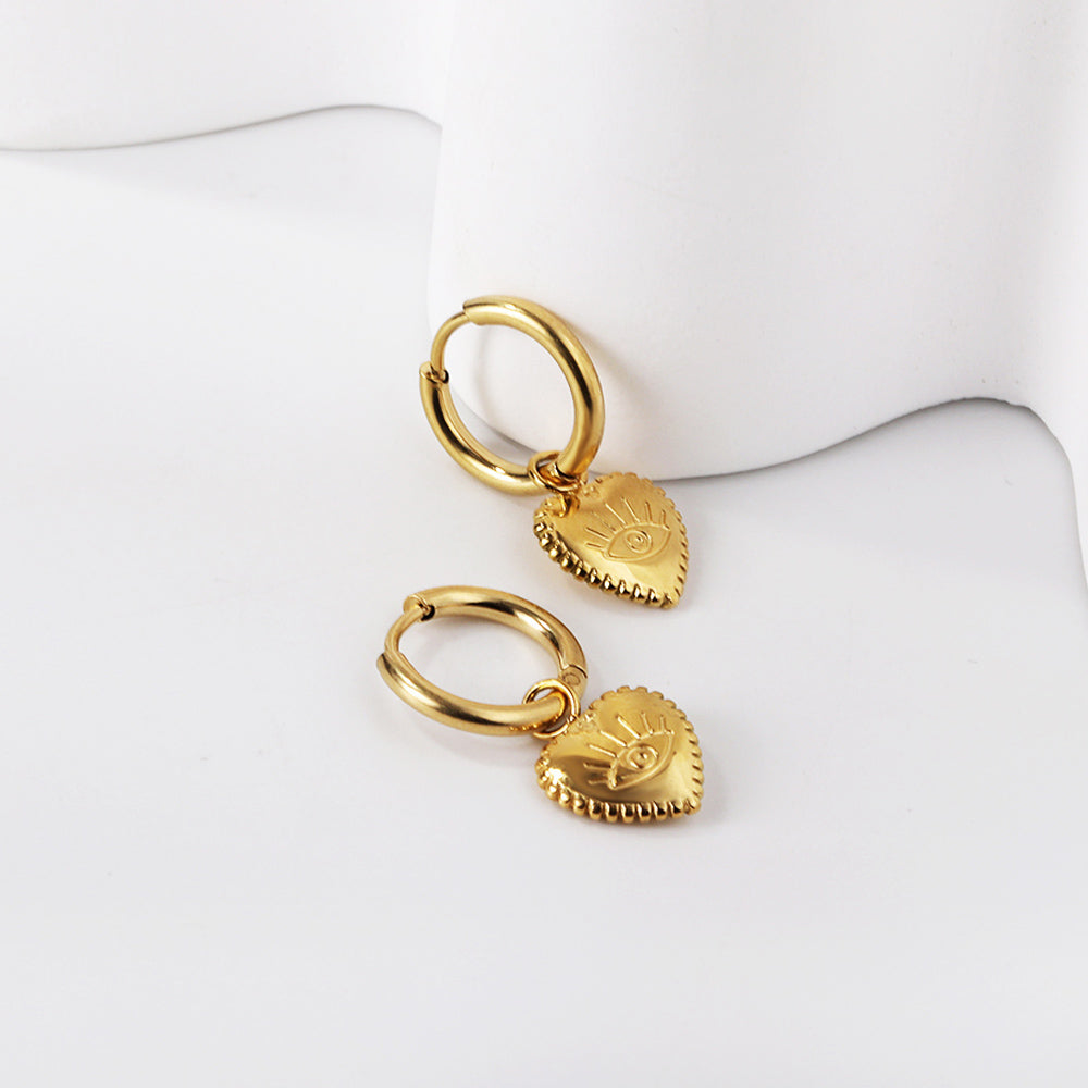 Boucles d'oreilles rondes en forme de cœur avec motif œil