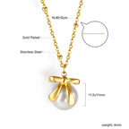 Ketting met strik en witte parelhanger