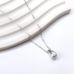 Collier pendentif goutte d'eau en acier inoxydable