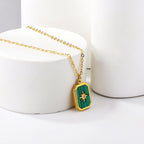 Zwarte en groene schelpenhangerketting