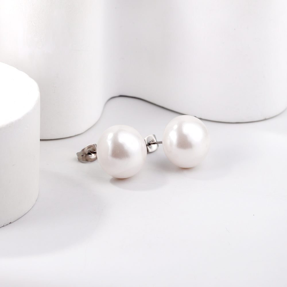 Platte witte parel oorbellen