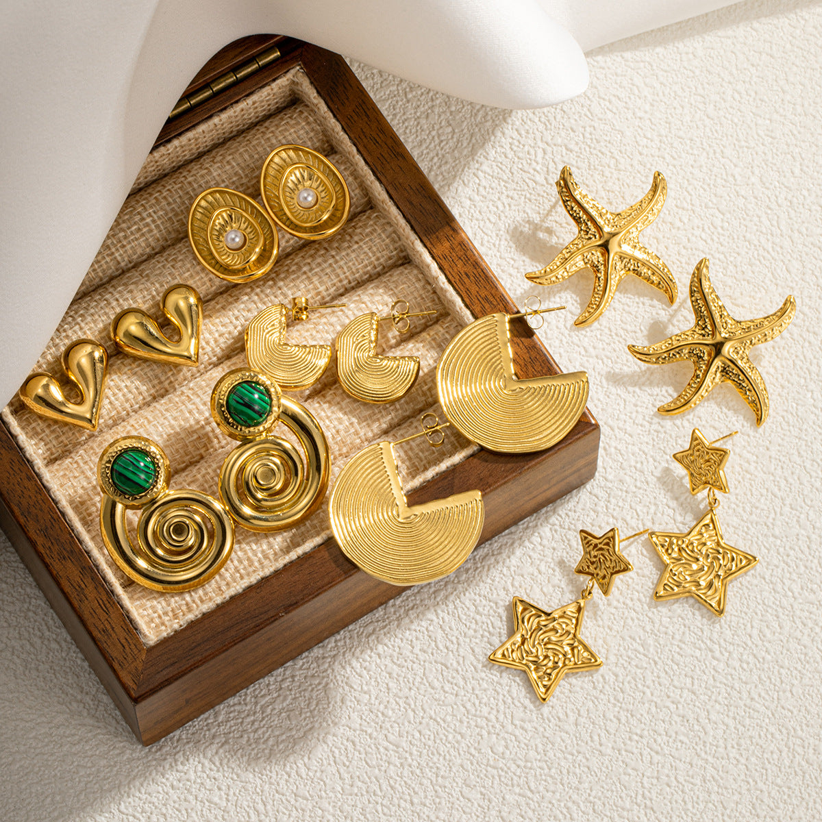 Geometrische goudkleurige holle oorbellen