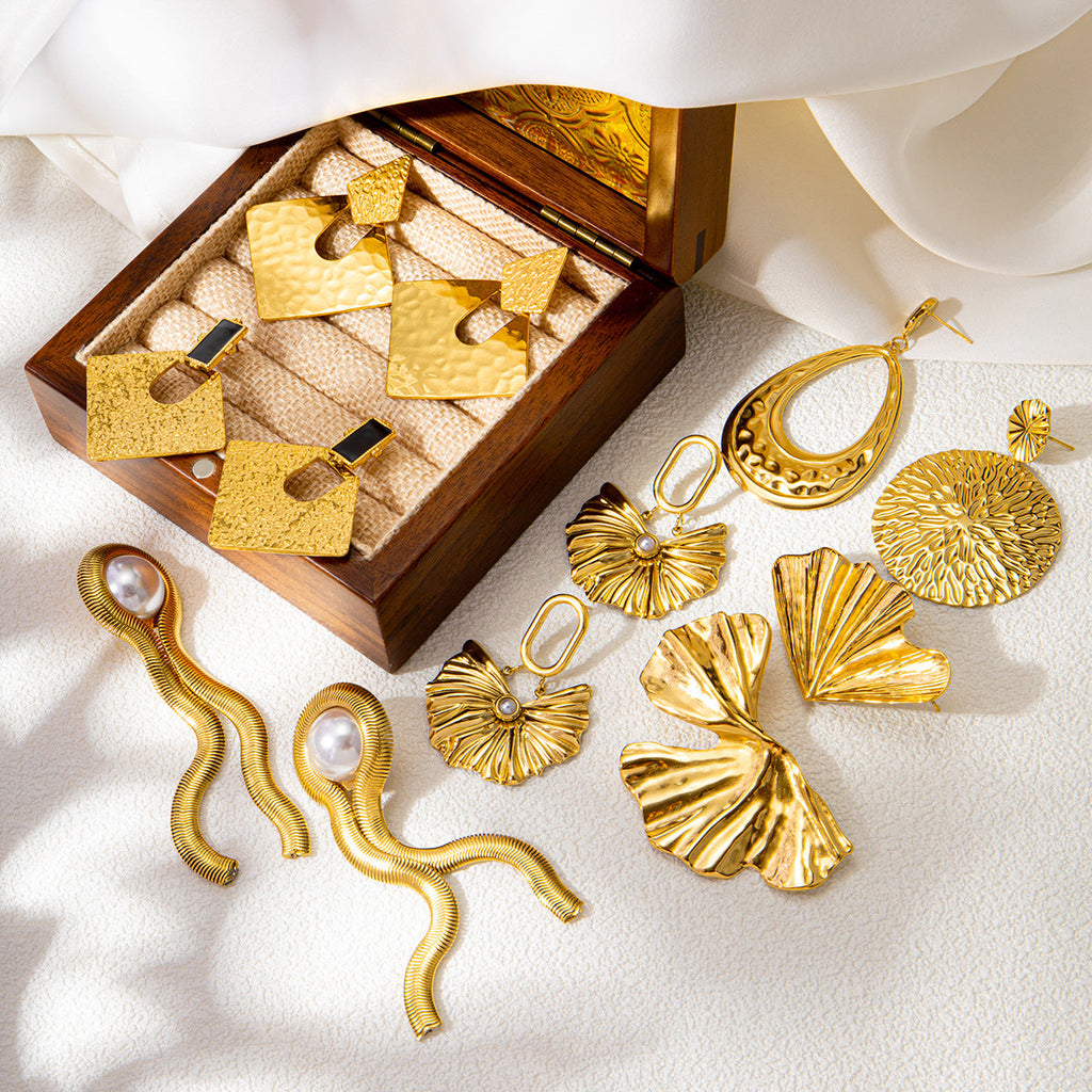 Origineel ontwerp goudkleurige oorbellen