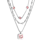 Drievoudige ketting met groen hart en roze zirkonia bedeltjes