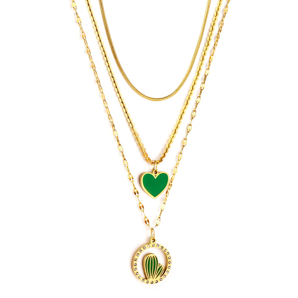 Drievoudige ketting met groen hart en roze zirkonia bedeltjes