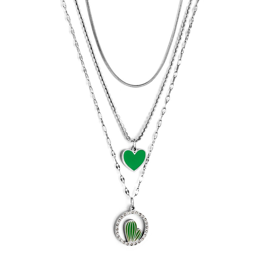 Drievoudige ketting met groen hart en roze zirkonia bedeltjes