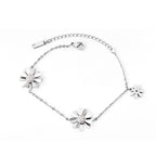 Dikke armband met gouden hartbedel 