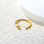 Minimalistische goudkleurige open manchetring 