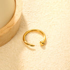 Minimalistische goudkleurige open manchetring 