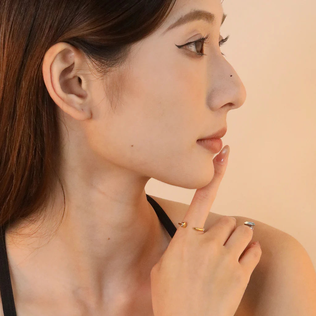 Minimalistische goudkleurige open manchetring 