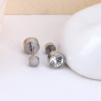 Set van 12 paar gouden oorbellen met schroefdeksel en zirkonia 